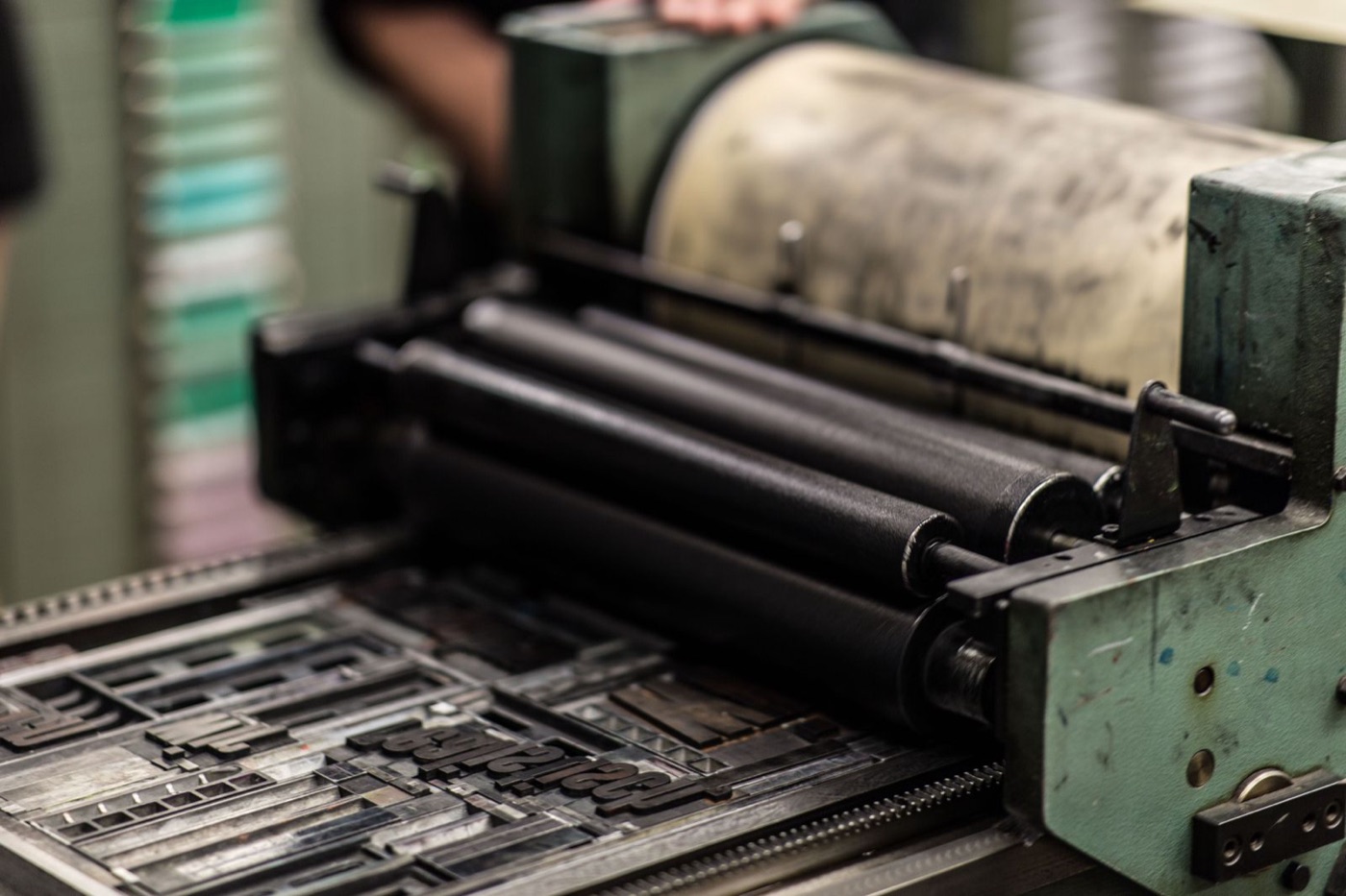 Offset press rollers with ink